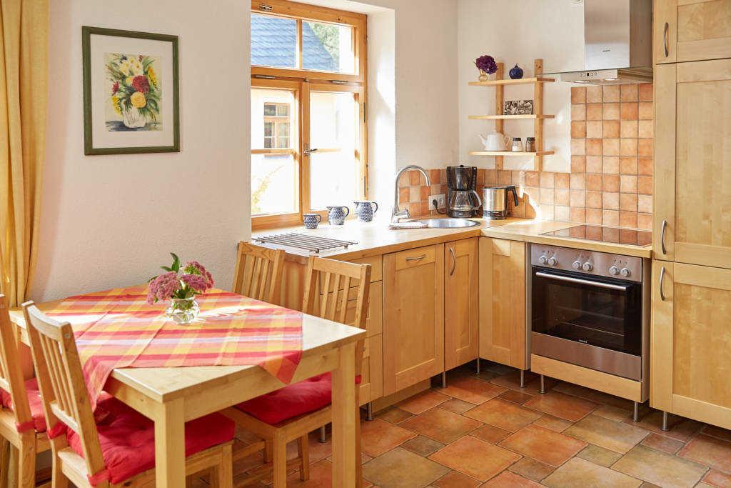 Wohnküche mit Kamin Ferienwohnung WE2